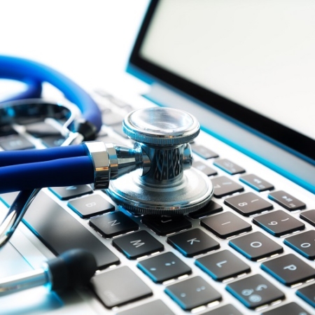 stethoscope on laptop